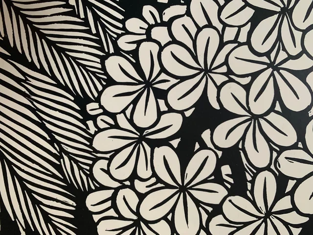 Decorative black-and-white botanical pattern featuring clustered plumeria flowers and palm-like leaves.